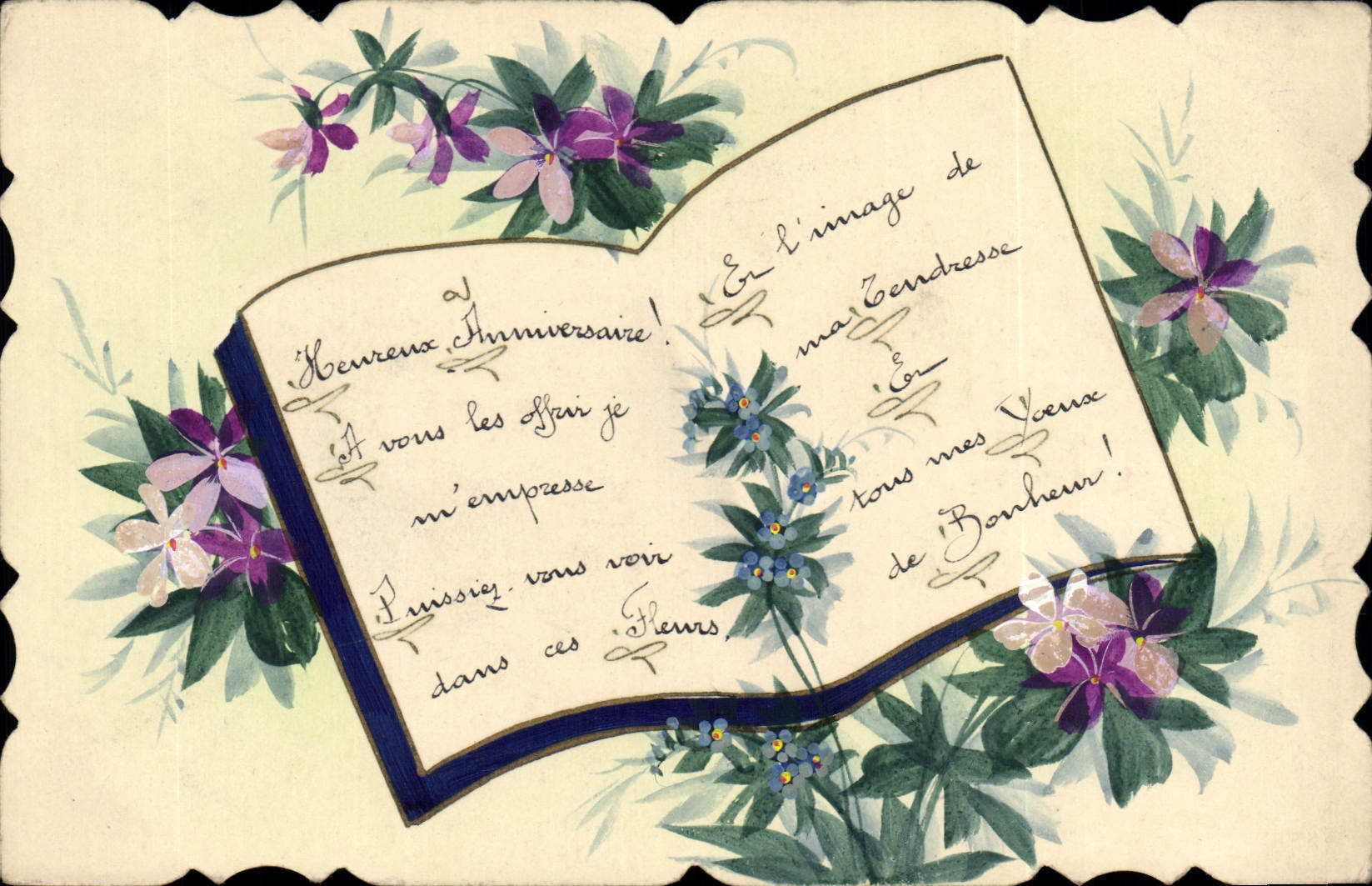 Anniversaire — livre ouvert orné de violets — texte manuscrit