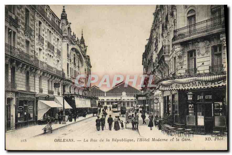 CPA Orleans La Rue de la Republique l'Hotel Moderne et la Gare Hotel du Commerce
