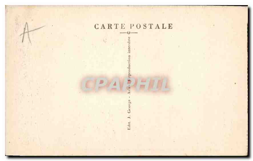 Les Baux — Route en lacet conduisant au village, en haut, ruines imposantes du Château des Baux — J. George — Verso