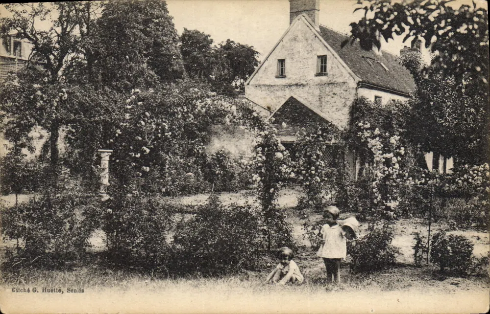 Jardim com casa em Senlis — cliché G. Huettes - Frente