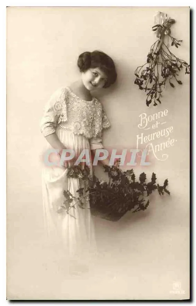 Jovem mulher segurando um cesto de galhos — Boa e Feliz Ano — Editor: NURIE, n° 12 - Frente