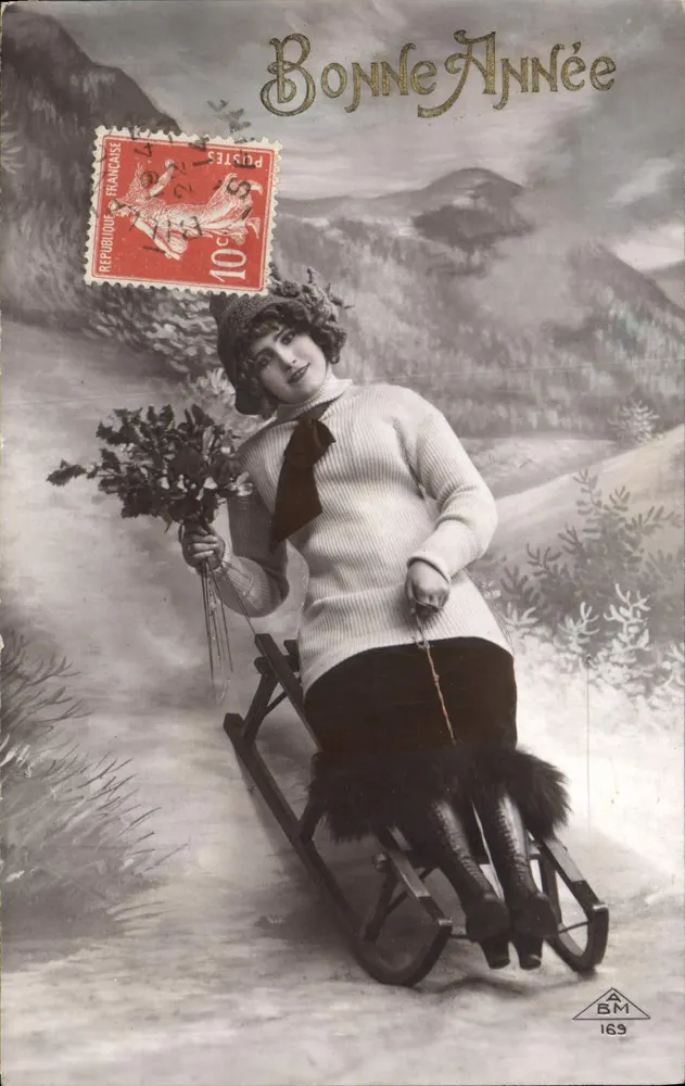 Frau im Schlitten in den Bergen — Frohe Weihnachten — Verlag A.B.M. n°163 - Vorderseite
