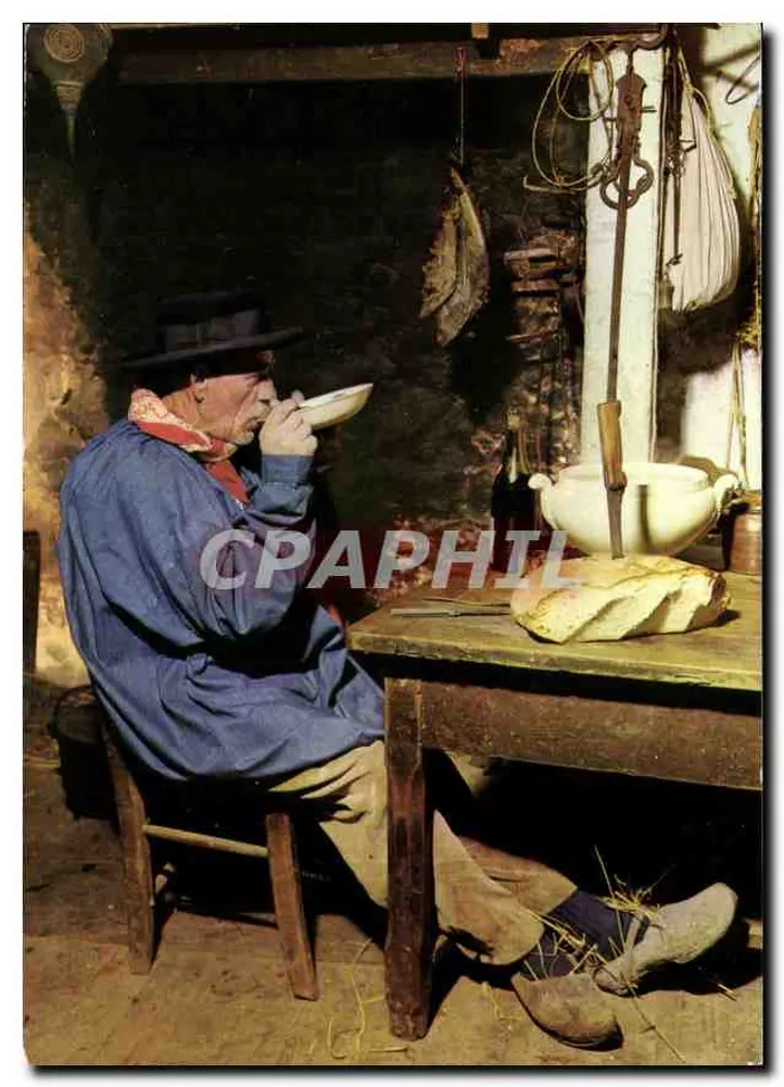 Homem com chapéu comendo à mesa — Em Périgord — n°91 - Frente