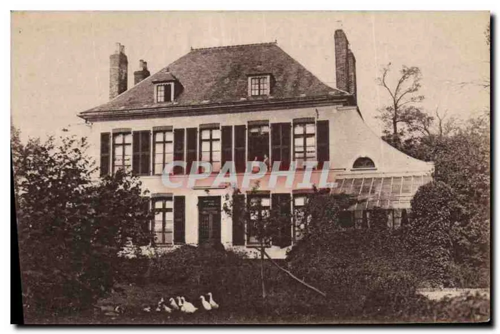 Casa com estufa — vista do jardim — editor não identificado - Frente