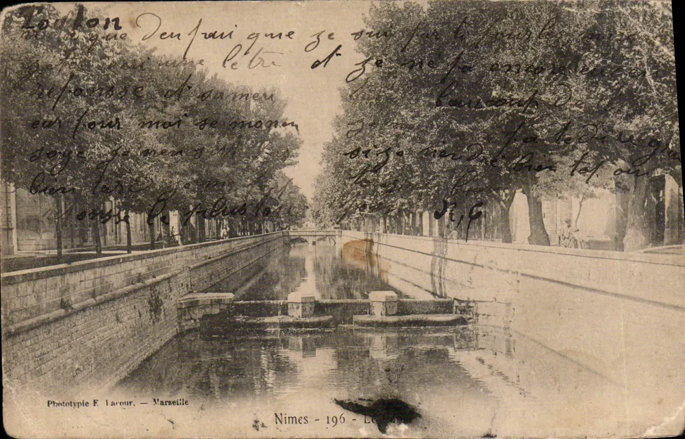 Canal de Nîmes — vue du canal avec pont et arbres — Phototypie F. Lacour, Marseille, n° 196 - Frente