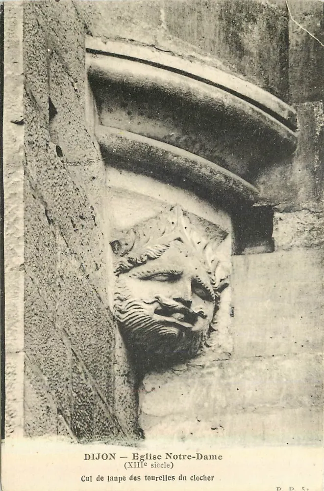 Dijon — Igreja Notre-Dame (século XIII) — Cul de lampe das torres da torre sineira - Frente