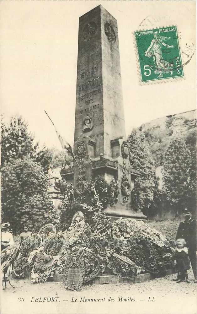 Lelfort — El Monumento de los Móviles — LL - Anverso
