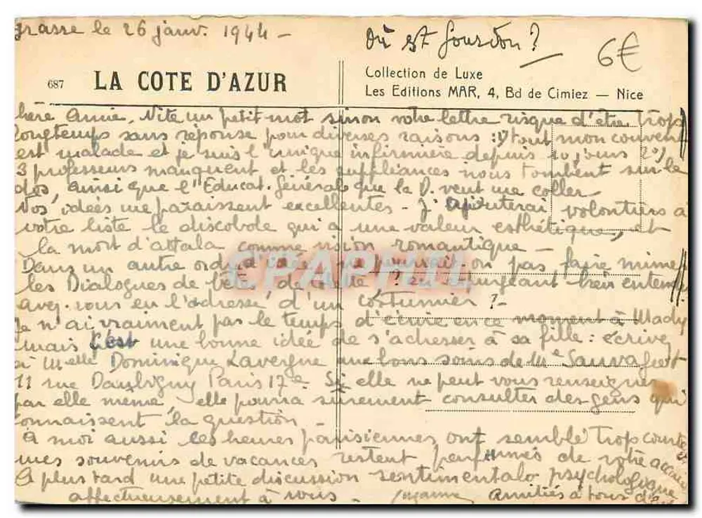 गुर्डॉन - लैकेट्स — एक पैनोरमा दृश्य जिसमें घुमावदार रास्ता और चट्टानों पर एक इमारत है - पीछे