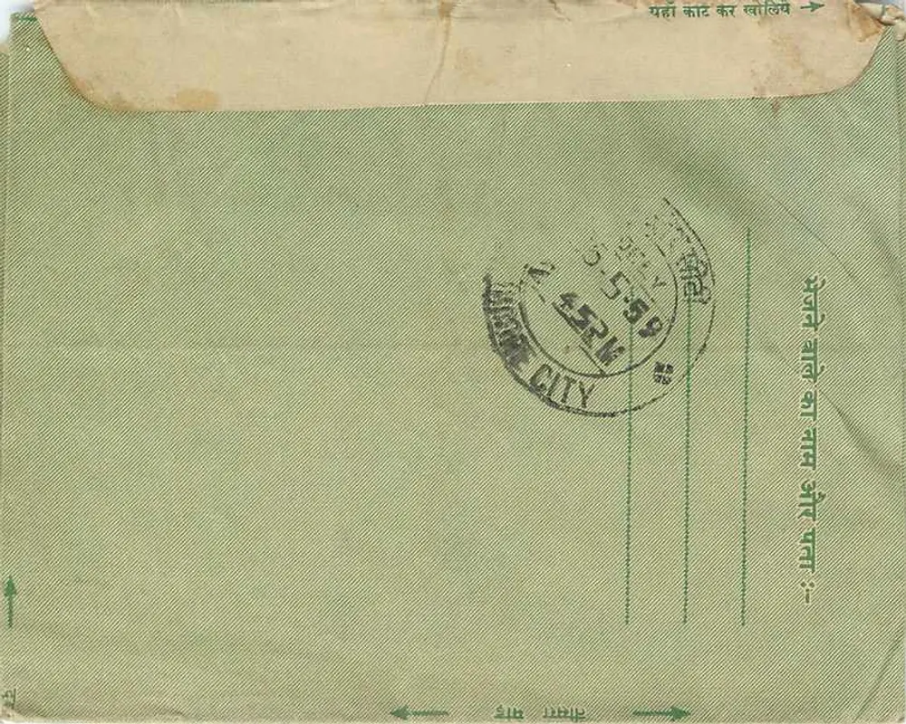 Carta postal verde — Índia — selo 10 annas — destinada a Indore - Verso