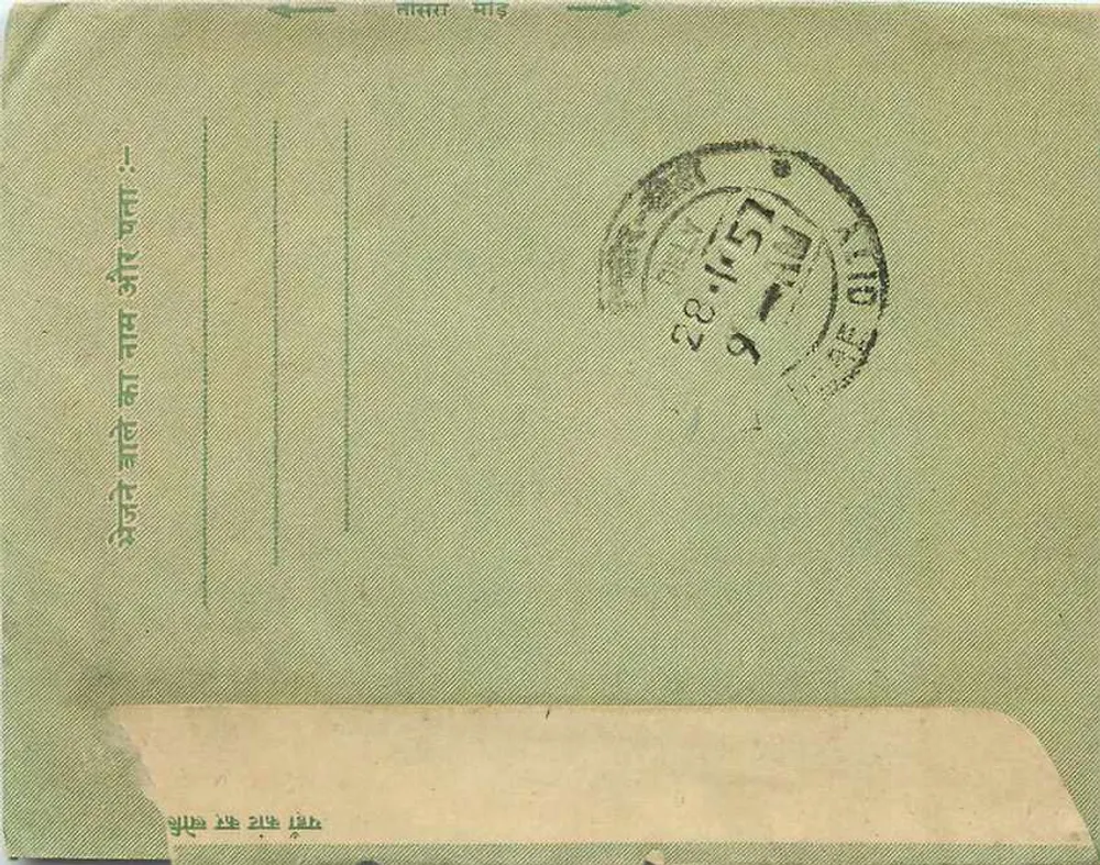 Carta postal indiana — texto em devanagari e escrita manuscrita — editor não visível - Verso