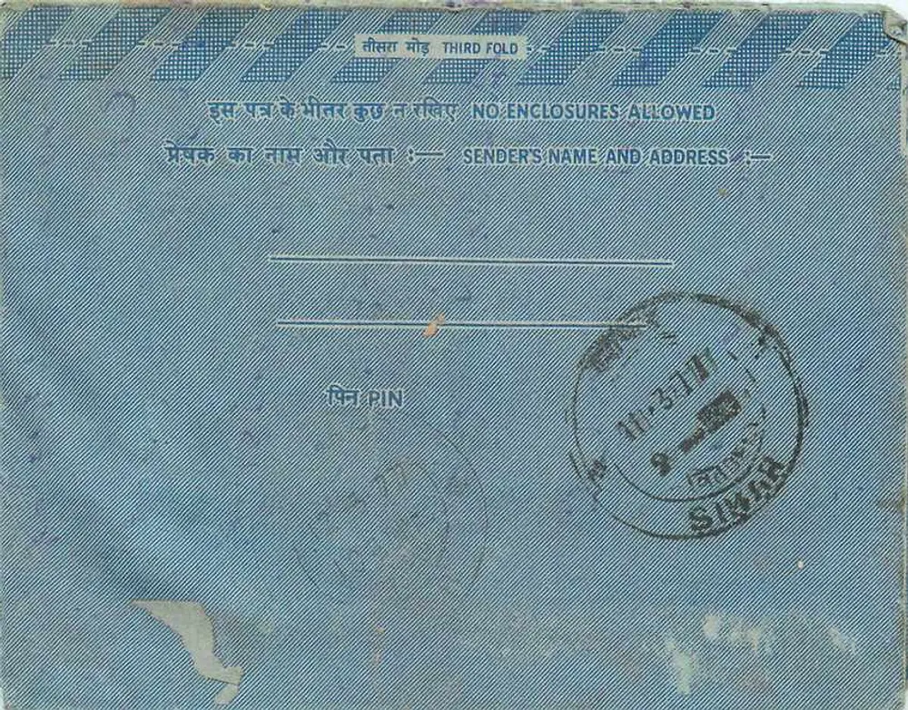 Carta postal interior indiana — selo de 20 annas — destinatário em Simar - Verso