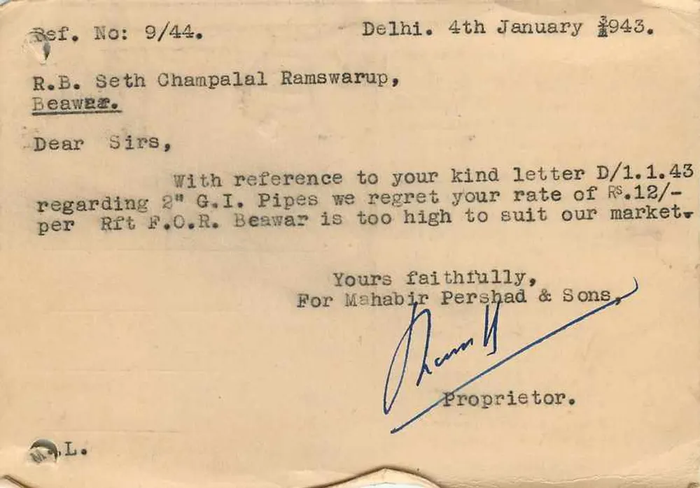 Mahabir Pershad & Sons — Delhi — Agentes de empresas de cimentos e tubos — 9 pence India Postage - Verso