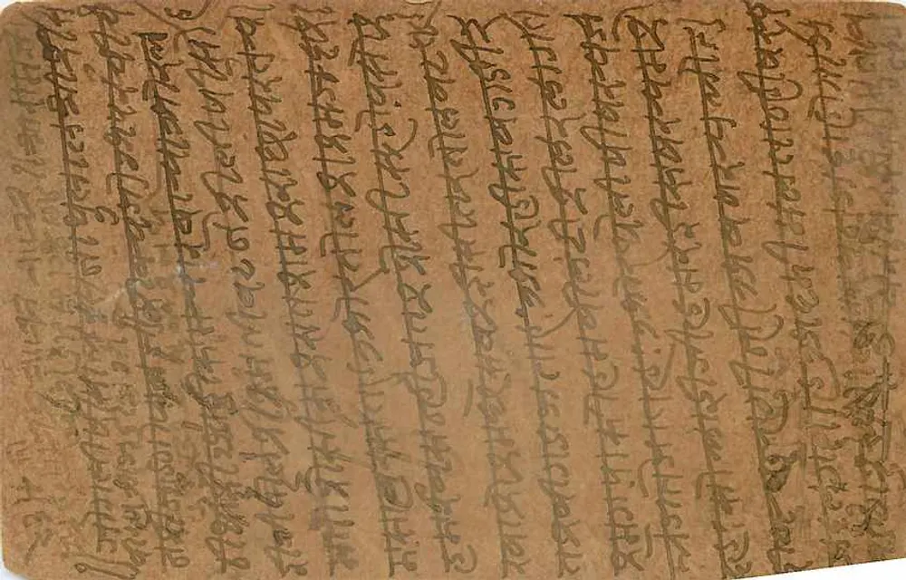 भारतीय पोस्टकार्ड — तिब्बती लिपि में लिखा टेक्स्ट — एडिटर अज्ञात - पीछे