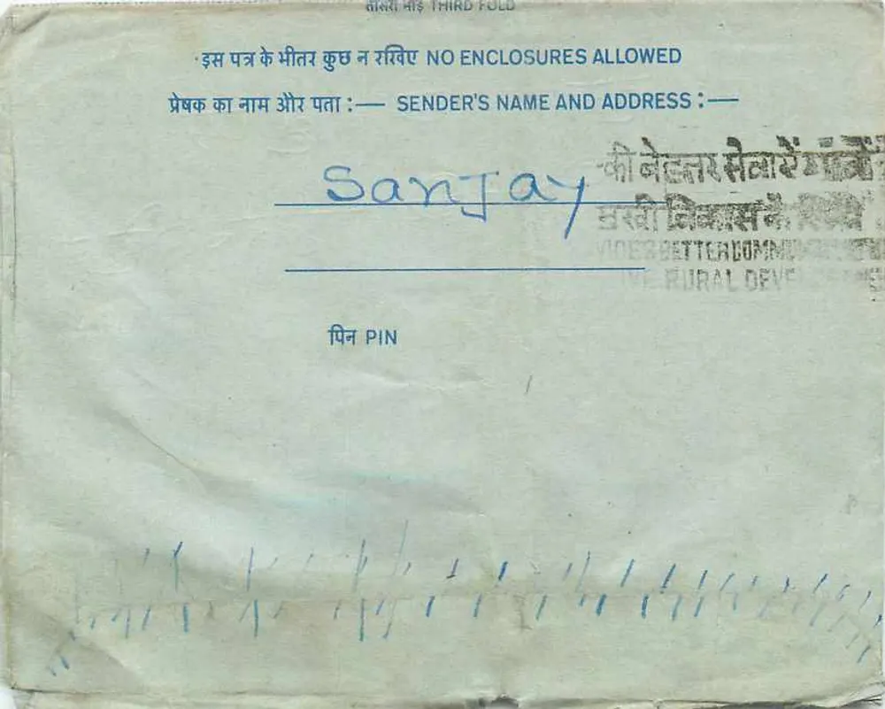 Carta postal interna indiana — texto em hindi — selo de 20 annas - Verso