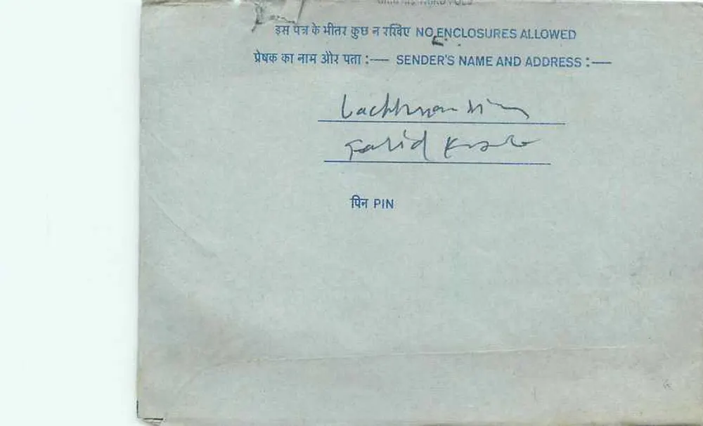 Carta postal interna indiana — selo azul de 20 annas — destinatário Lachhman N. Patel - Verso