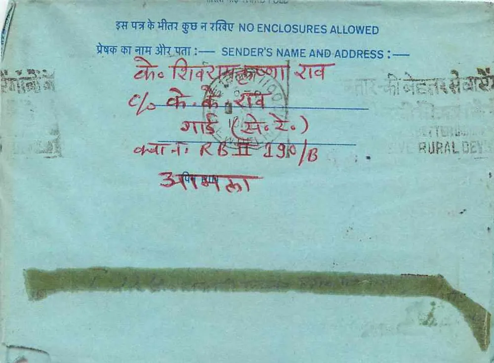 Carta postal interna indiana — texto em hindi — selo de 20 annas - Verso