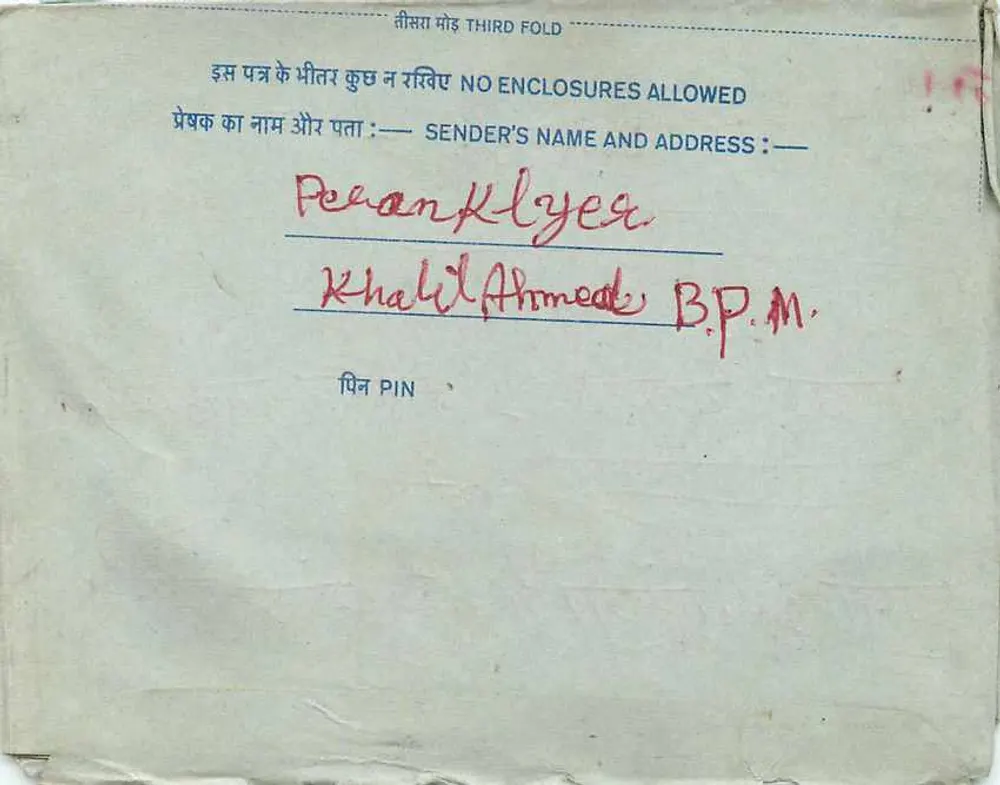 Carta postal interna indiana — selo de 20 annas azul, texto em hindi e inglês — destinatário Khalil Ahmed B.P.M. em Delhi - Verso