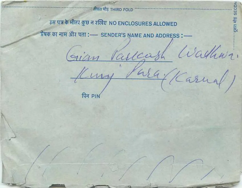 Carta postal interna indiana — selo de 20 annas — destinatário em Karnal - Verso