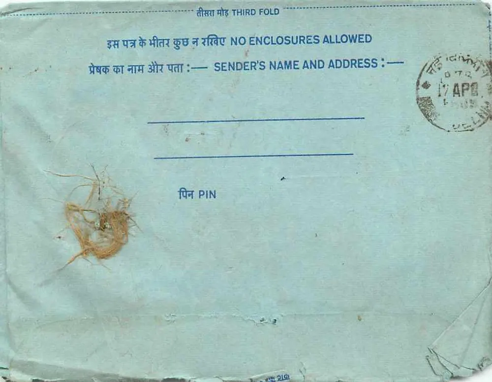 Carta postal interior indiana — selo de 20 annas — destinatário em Pune - Verso