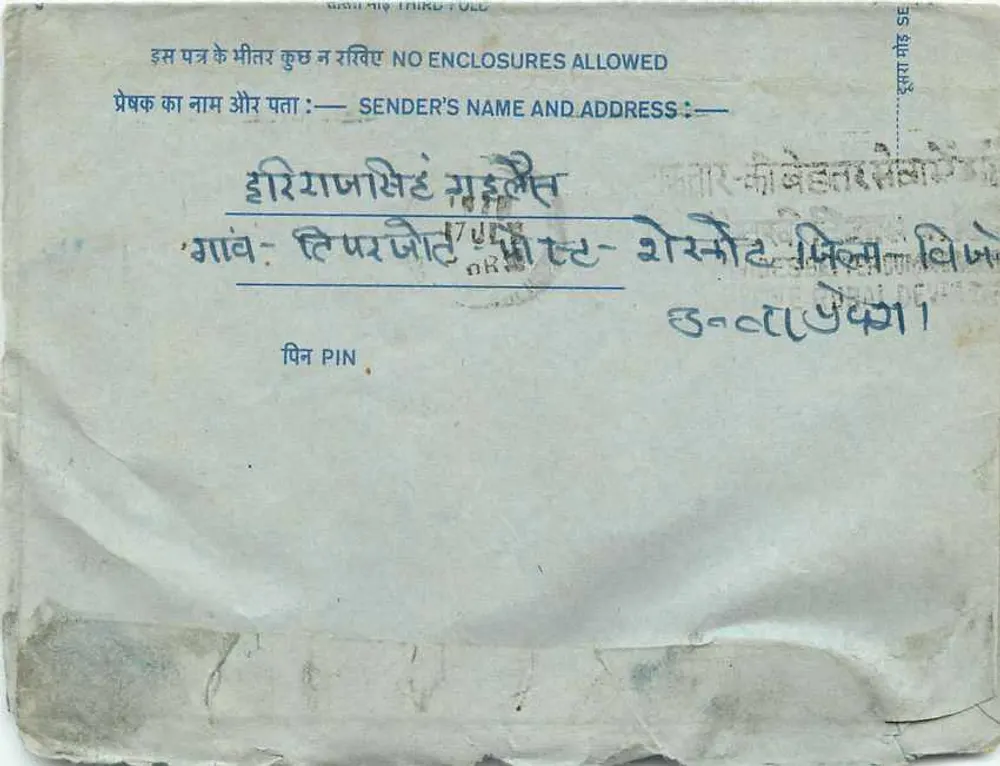 Carta postal interna indiana — selo de 20 annas — destinatário em Delhi - Verso