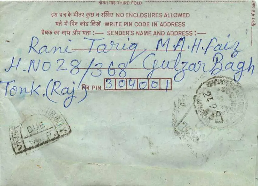 Carta postal interna indiana — destinatário em Jaipur, remetente em Tonk — selo de 15 annas, carimbo 'Jaipur' e 'Tonk' - Verso