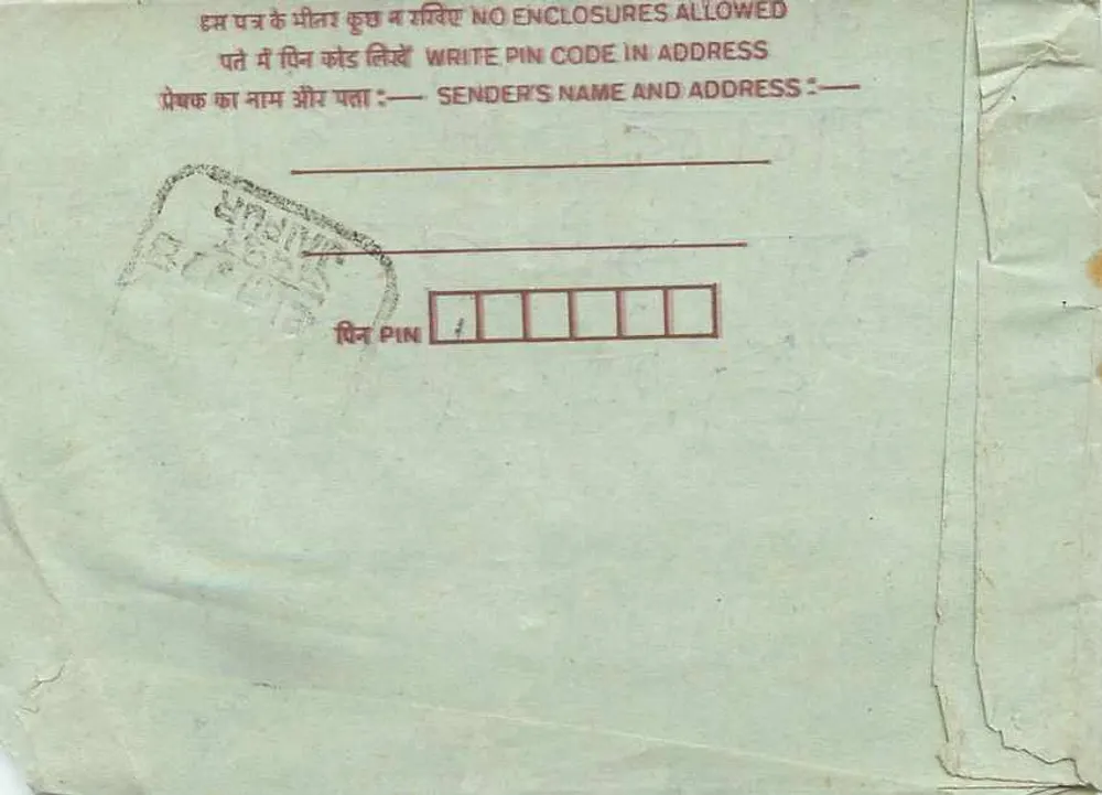 Carta postal interna indiana — texto manuscrito em hindi e endereço a Toulouse, França — selos variados - Verso