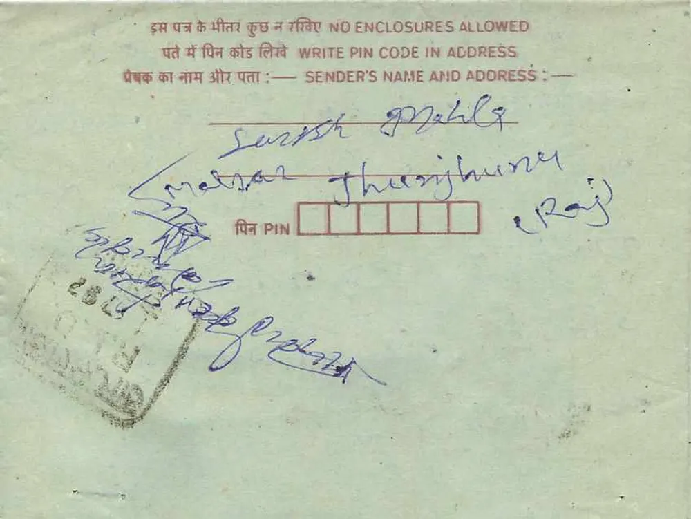 Carta postal interna indiana — texto em devanagari, selo de 75 paise, carimbo visível — verso com endereço do remetente e carimbo postal - Verso