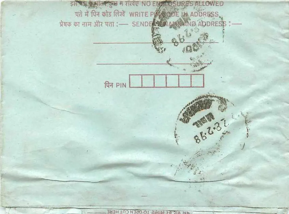 Carta postal indiana — selos de 25 e 75 anos, cancelamento 'INDIA' — verso com instruções e carimbo postal - Verso