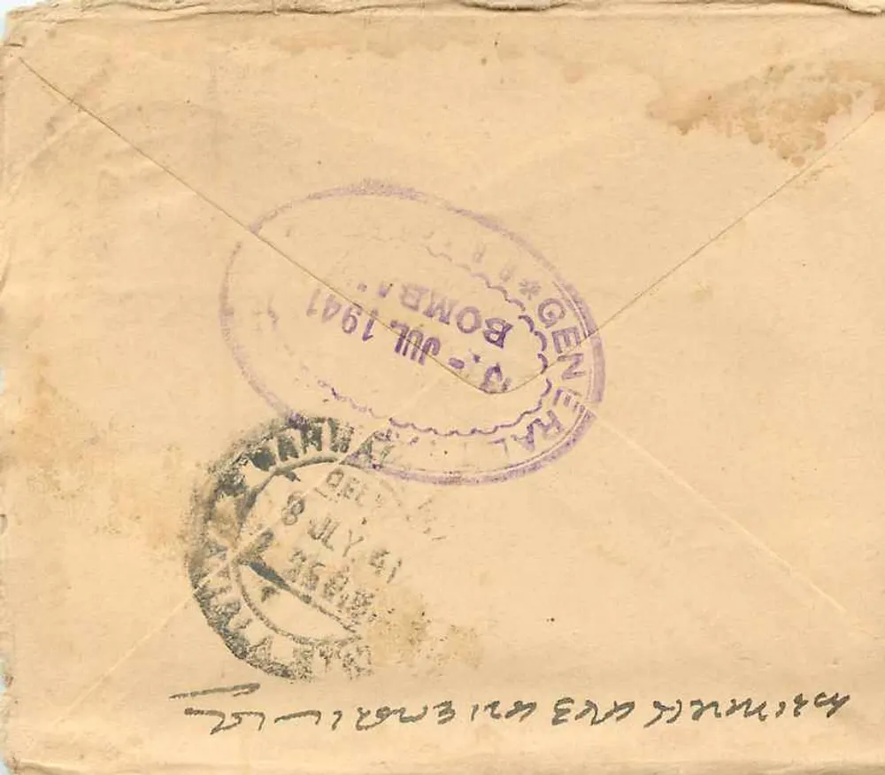 Carta postal endereçada ao Sr. Bhimuraj Jammadas em New Mumudi, Narmandal — selo da Índia de 1 anna 3 pies e selo postal de Bombay, 14 de julho de 1941 - Verso