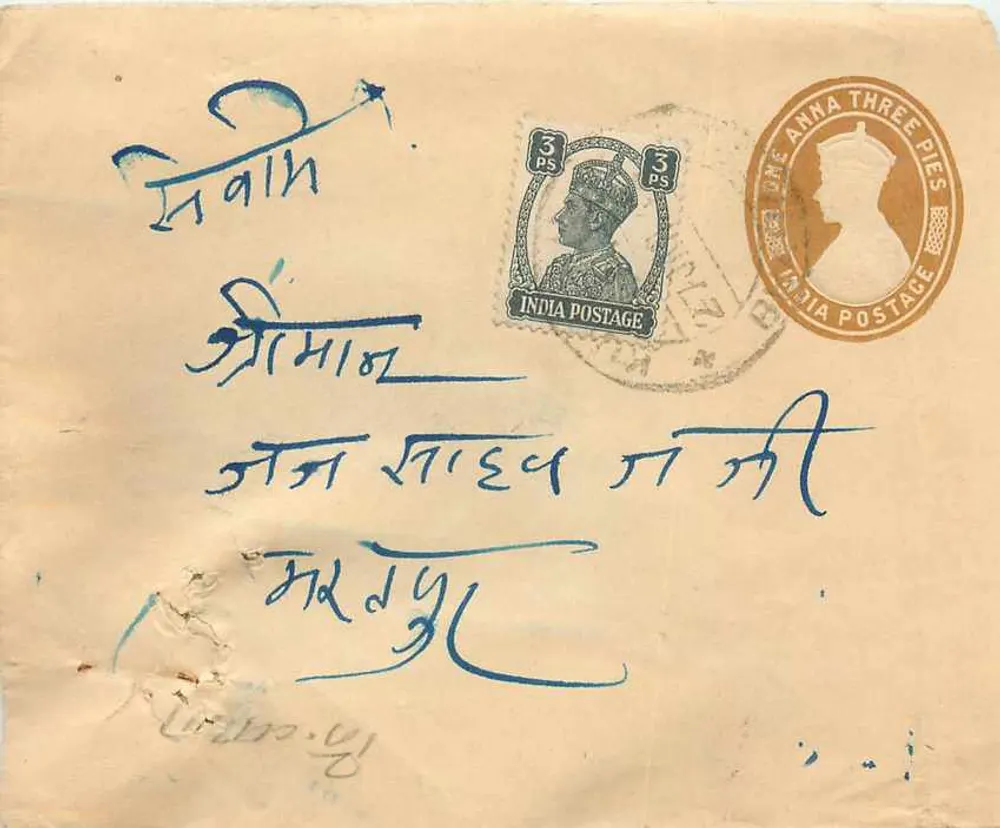 Carta postal indiana — selo de 3 pence George V — carimbo 'Anna Three Pies' — destinatário em escrita devanagari — carimbo de postagem de Bombaim 28.4.43 - Frente