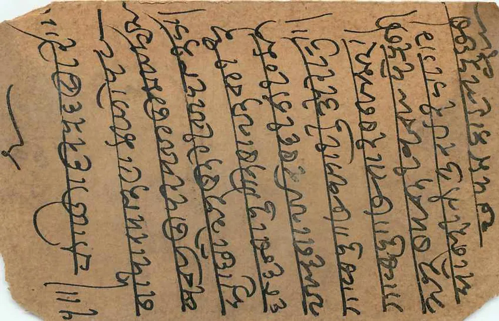 Carta postal indiana — escrita em script birmanês — destinada a Bambley, Inglaterra — selo e carimbo do dia 26 de julho de 1925 - Verso