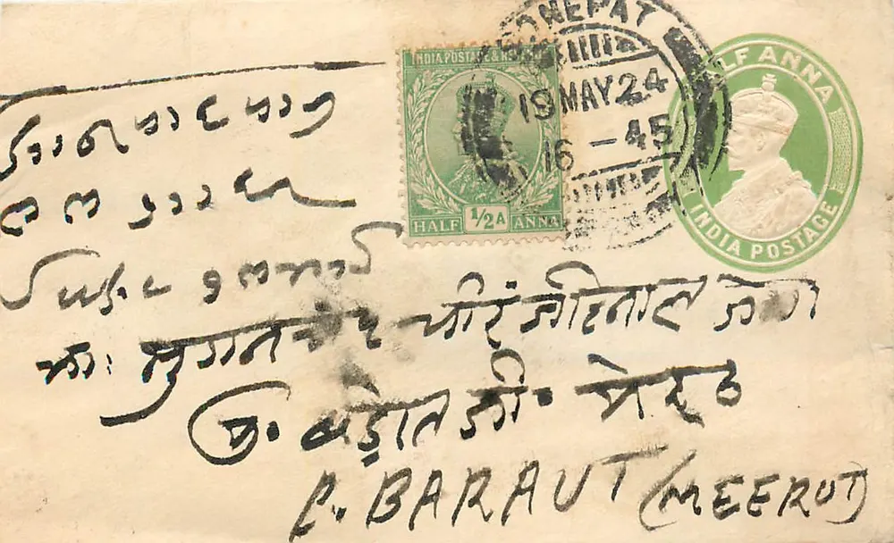Carta postal indiana — texto em escrita devanagari — destinatário em Baraut (Meerut) — selos e carimbos postais - Frente