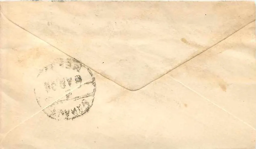 Carta postal de Calcutá — texto em escrita devanagari — carimbo verde da Índia - Verso
