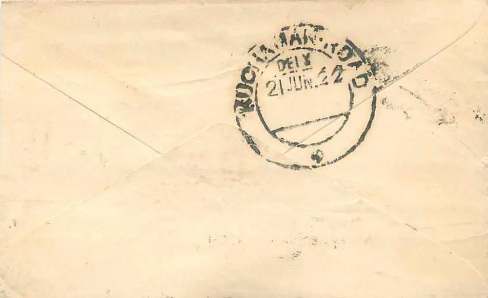 Carta postal indiana — texto em escrita devanagari — selo e carimbo de Delhi - Verso