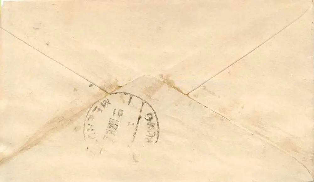 Carta postal da Índia — texto em escrita árabe — selo verde 'HALF ANNA' e carimbo postal - Verso