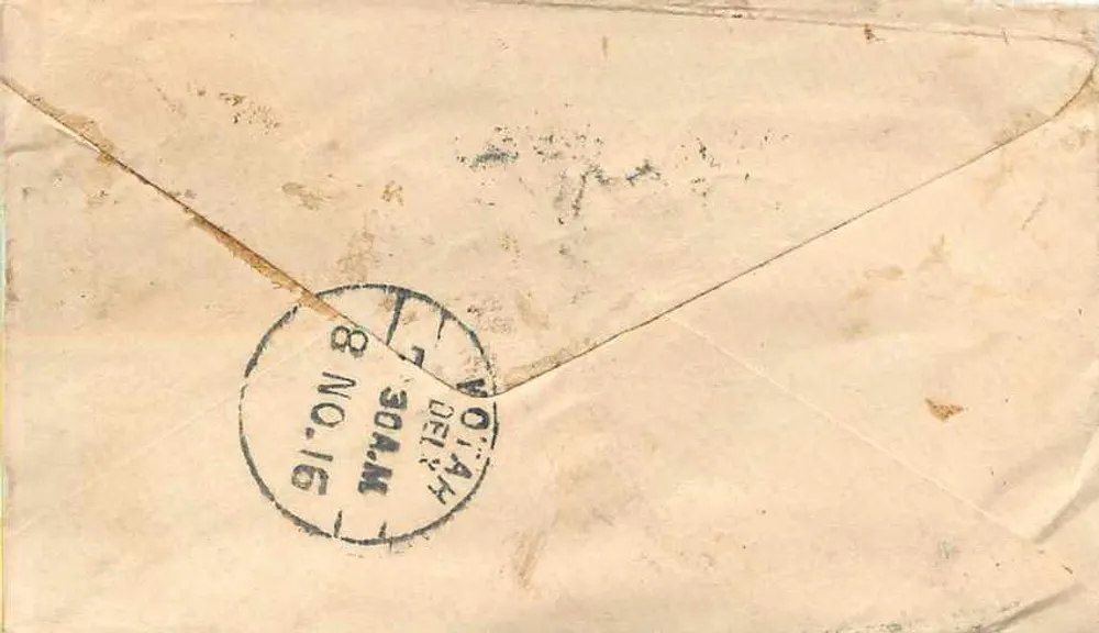 Kotah — Índia — selo postal verde com datação 'HALFANNA INDIA POSTAGE' e carimbo de trânsito 'NOTAY DELI 8 NO.16' - Verso