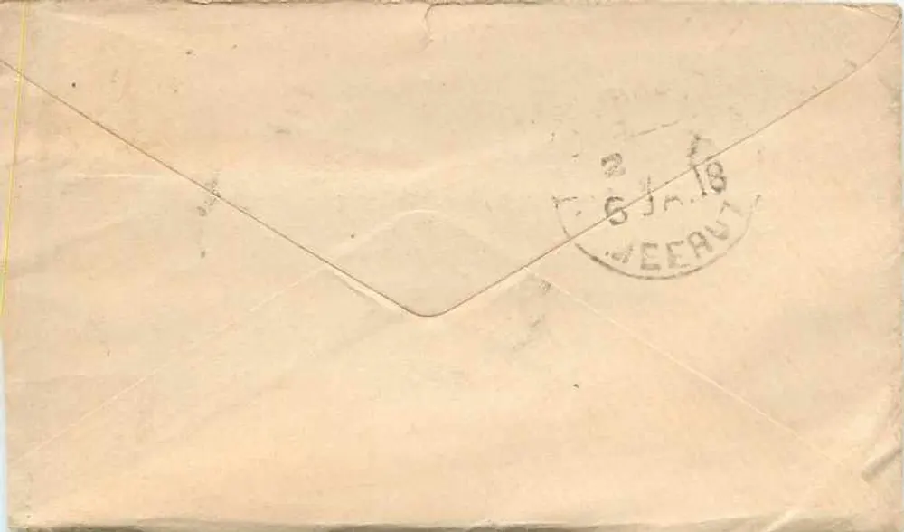 Carta postal destinada a Sugan Chand em Baraut — selo de catálogo de 1/2 anna e carimbo de Meerut - Verso