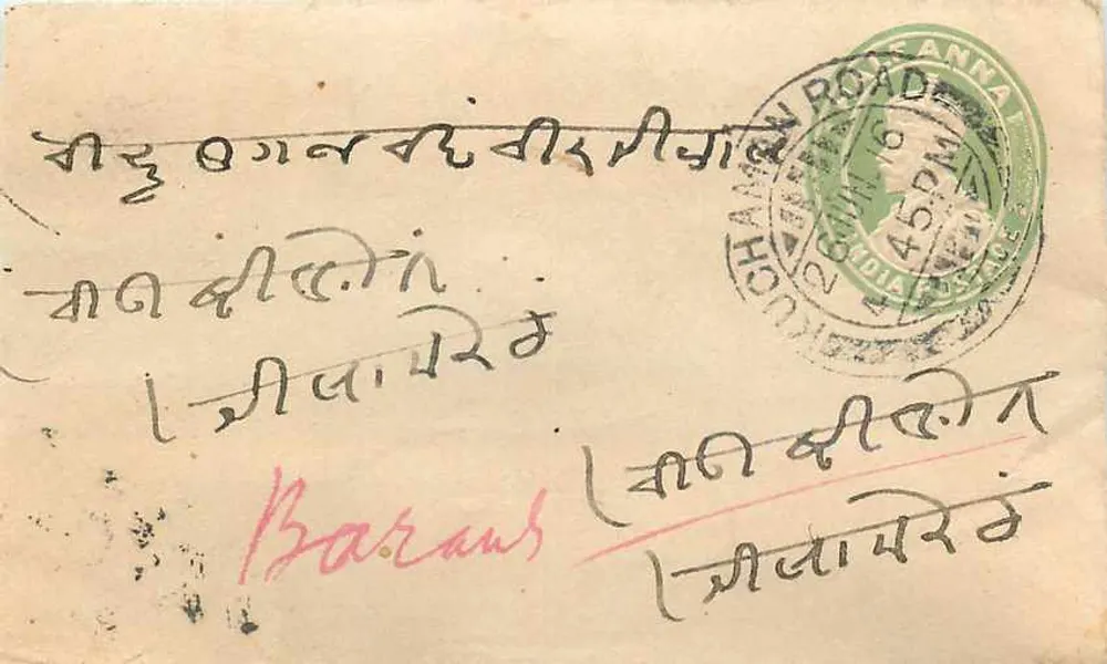Carta postal enviada da Chuchan Road, Annamalai Nagar — texto manuscrito em escrita local e em inglês, carimbo postal verde - Frente