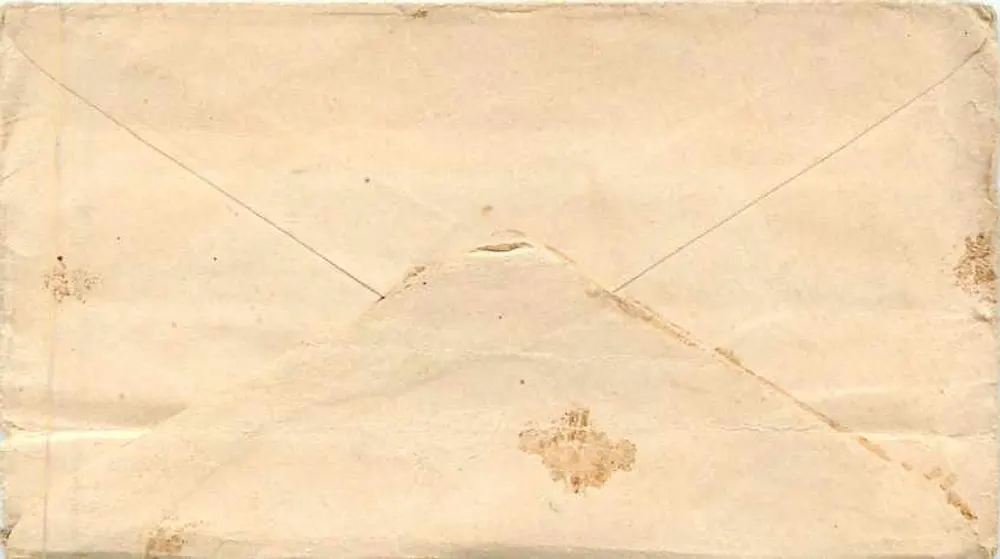Carta postal destinada a Raddasul, Delhi — selo e carimbo de Bara Bazar, Calcutta - Verso