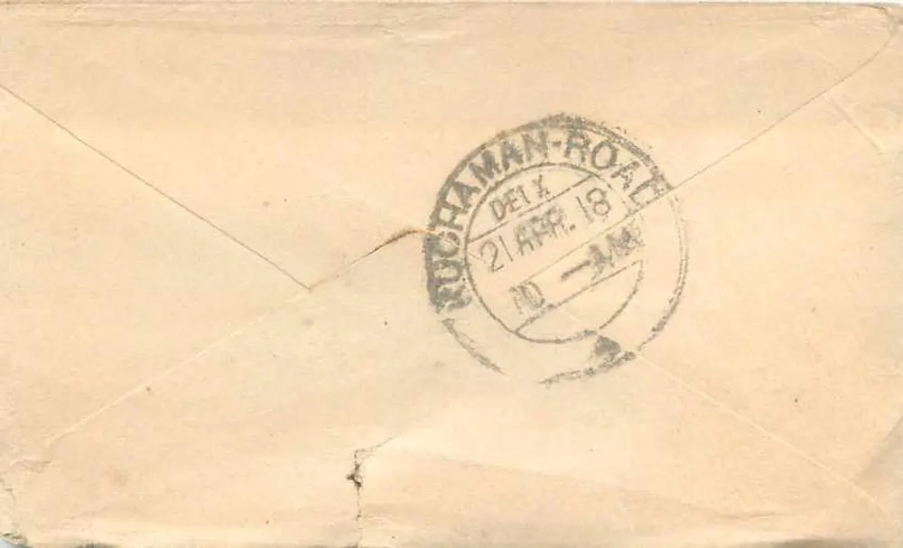 Carta postal enviada de Ruchaman Road, Delhi — texto em bengali e inglês — selo verde India Postage - Verso