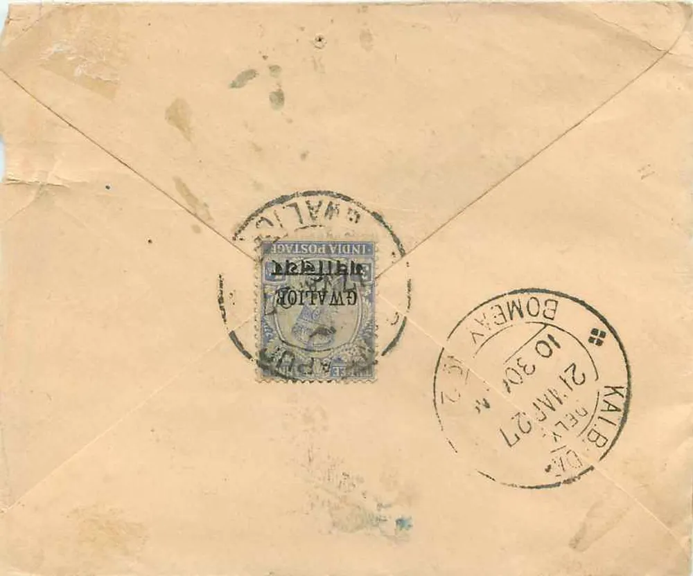 Gwalior — Encomenda postal registrada para Madhavpur — Gwalior Post Office - Verso