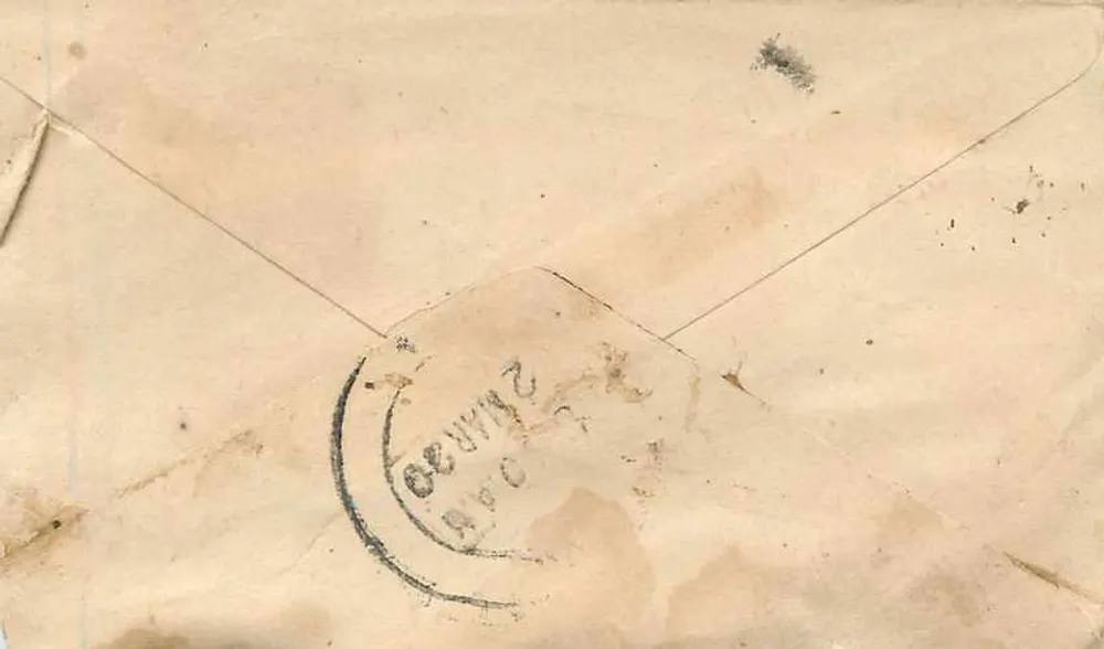 Carta postal de Cawalica — texto em escrita devanagari — selo e carimbo postal - Verso