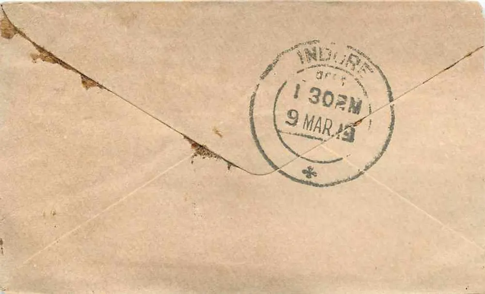 Gwalior — Indore — Half Anna stamp and postmark - Back