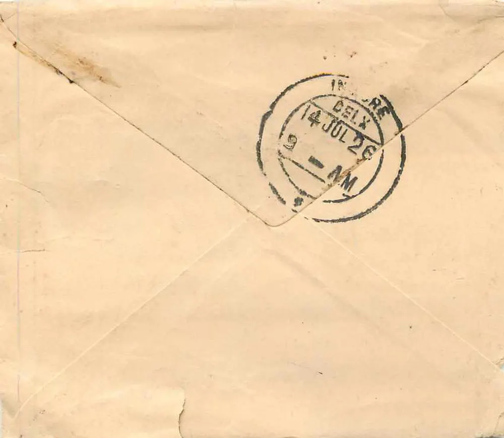 Carta postal endereçada a Bagatramji em Indore — selo de um anna e carimbo de Delhi - Verso