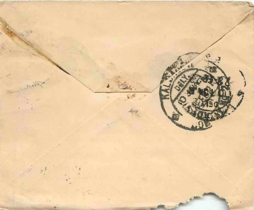 Carta postal de Kalimpong — texto em escrita devanagari — selo de um anna — carimbo postal de Kalimpong - Verso