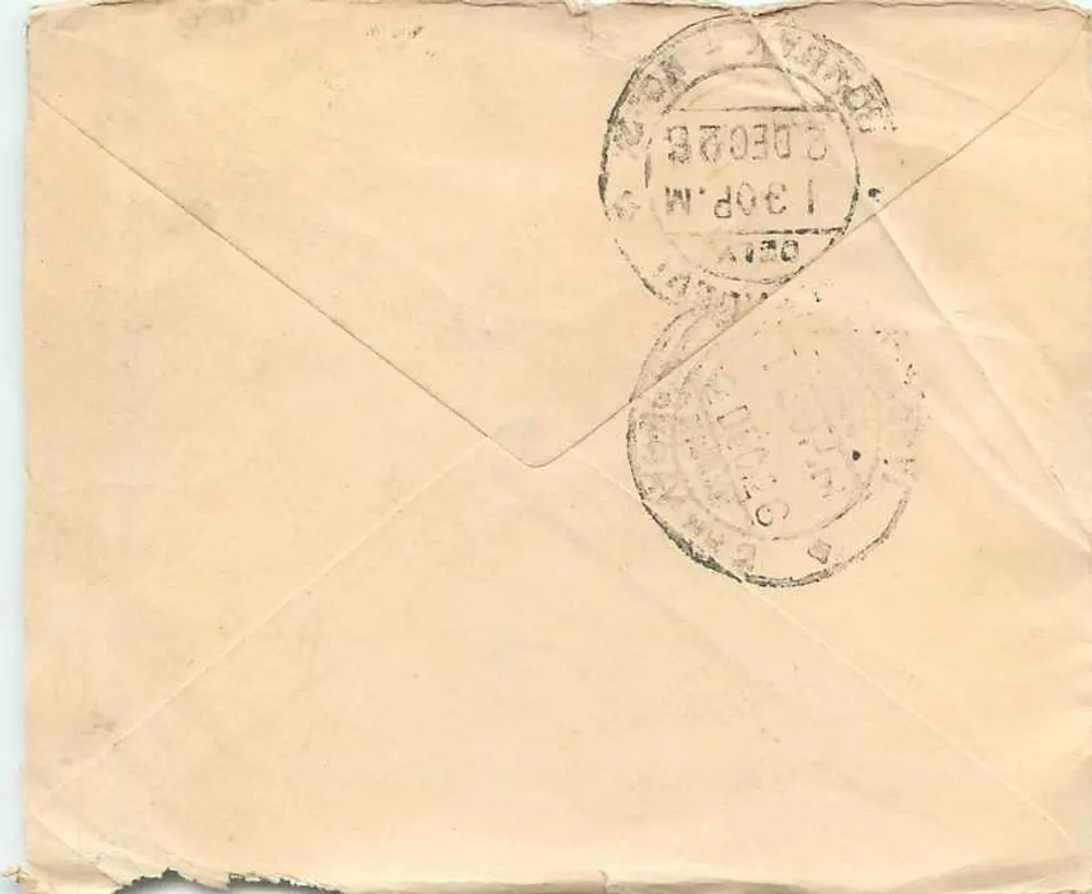 Carta postal indiana — texto em escrita bengali — selo da Índia e carimbo postal - Verso