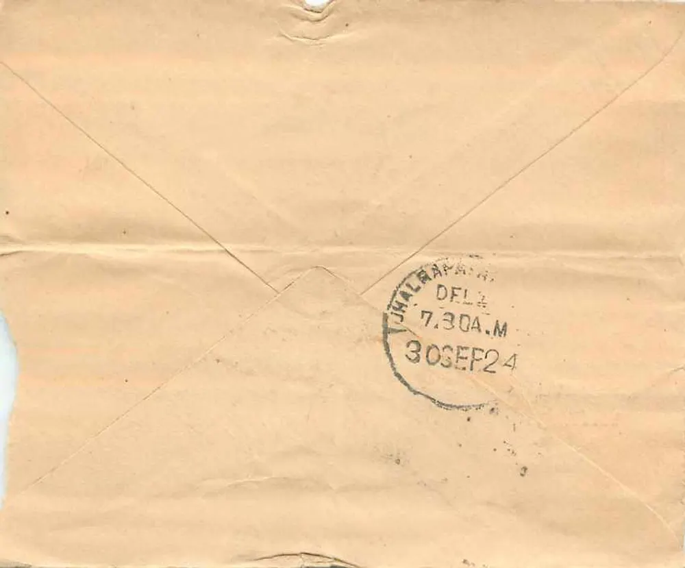 Carta postal da Índia — texto em escrita devanagari — selo de 1 anna — destinatário em Palam - Verso