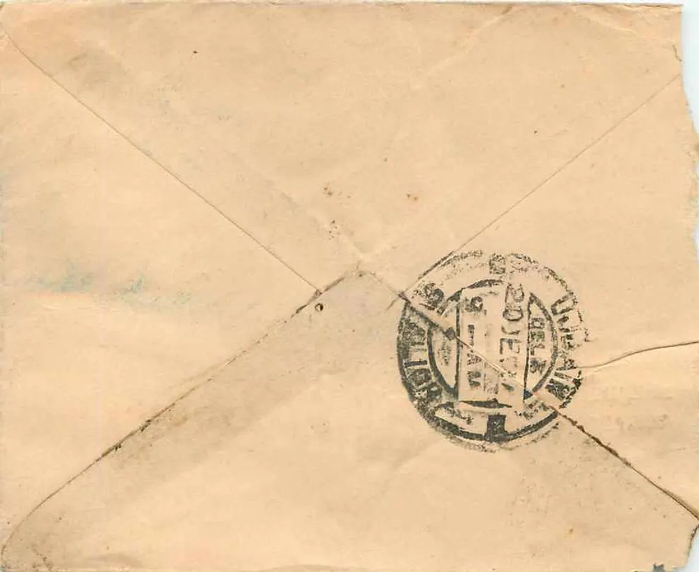 Cartão postal indiano — texto em escrita devanagari — selo da Índia britânica - Verso