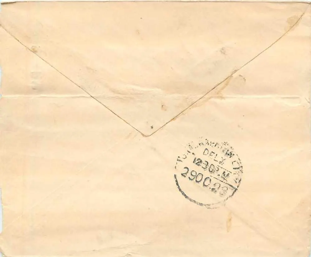 Carta postal de Delhi — selo da Índia e carimbo postal — destinada a Halrapatonem - Verso