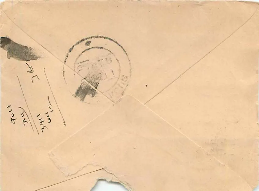 Carta postal indiana — endereço manuscrito em devanagari e em inglês — selo e carimbo de Walfor - Verso